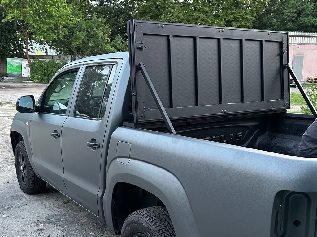 Two-section folding power pickup truck body cover